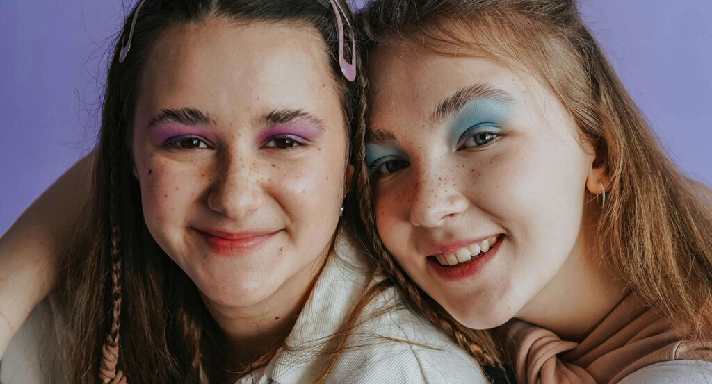 Two students smiling together for a photo